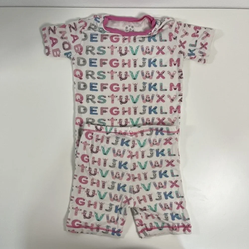 KicKee Graphic Short Sleeve Pajama Set, Ultra Soft and Snug Natural ABC Monsters